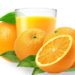 Апельсин целый в разрезе и сок в стакане